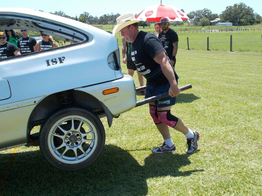 Show of strength: Organiser William Johnson of Veresdale Scrub, who placed third in the men's masters division, competes in the nationals.