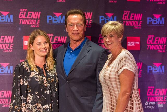 BEST IN THE BIZ: Brooke and Megan Read attended a seminar with Arnold Schwarzenegger. For a free copy of Meagan’s book go to www.meaganread.com.au. 