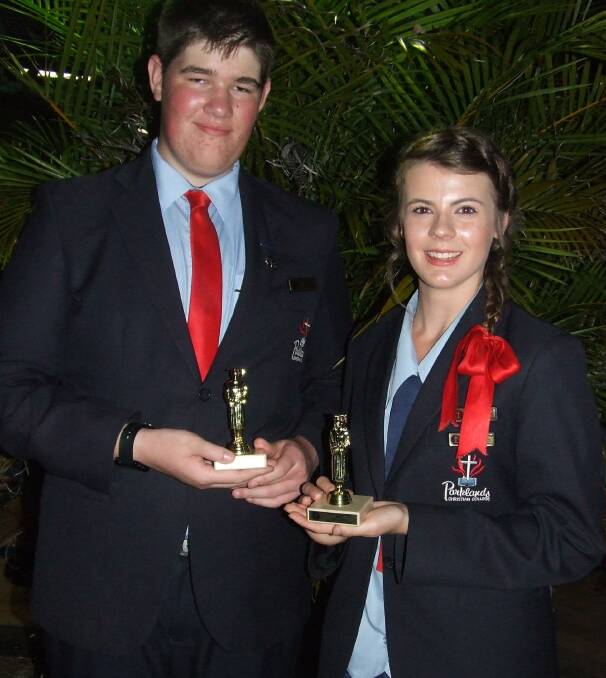 SUCCESS: Jay Lubach and Marnie Stollznow celebrate being Parklands Christian College's 2015 Duxes.