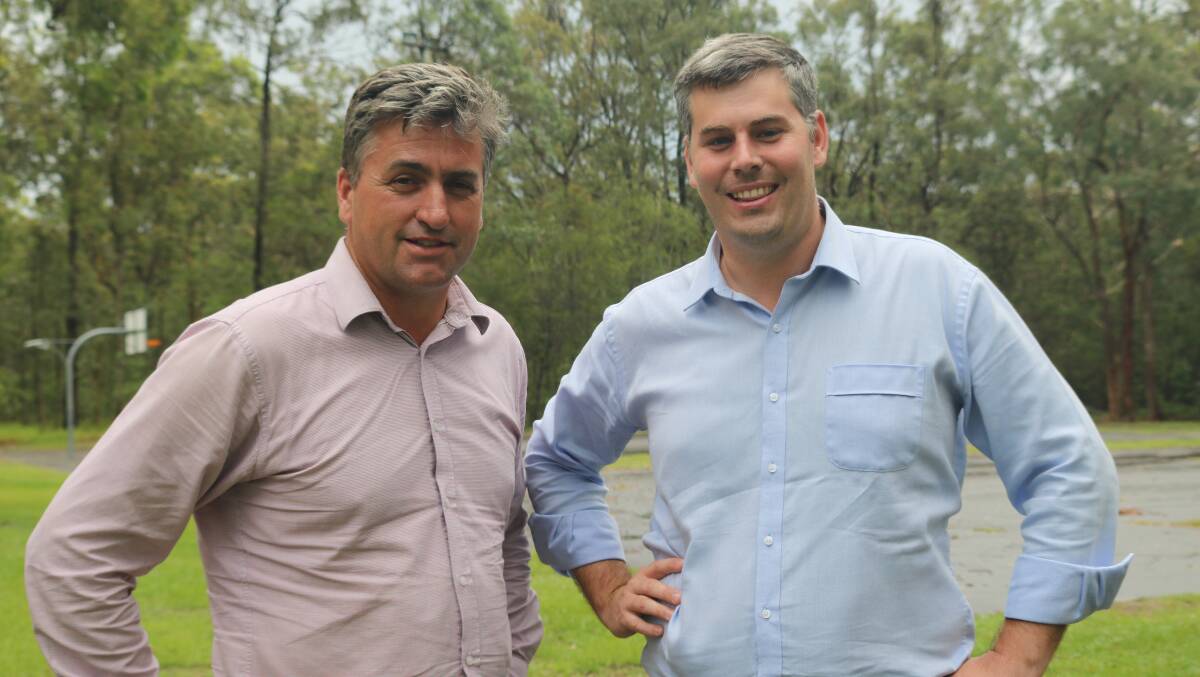 STATION PROMISED: Logan MP Linus Power and Police Minister Mark Ryan.