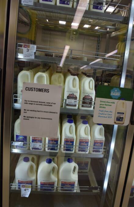 SALES: Logan Village Woolworths is among numerous supermarkets battling to keep up with the demand for branded milk that has swept across the state. 