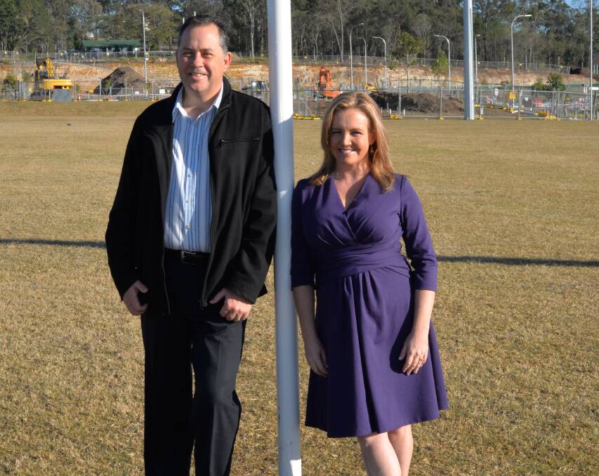 BUILDING: Cr Steve Swenson and Cr Laurie Koranski at the Shaw Street Oval in Yarrabilba, where a new $1.5 million sports and community hub will be built. Photo: Supplied