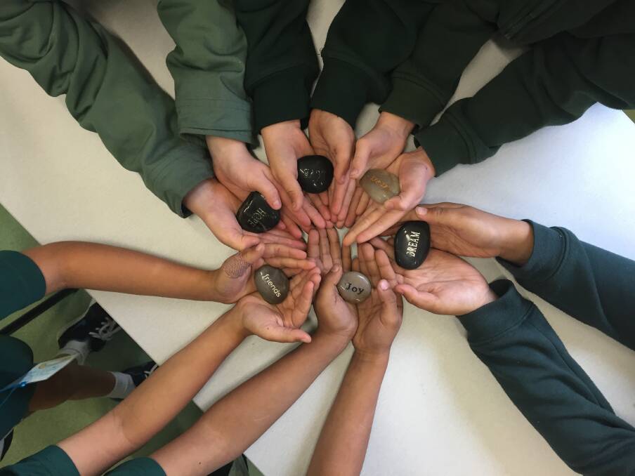 CLUB: Students from Browns Plains State School learn how to identify, articulate and manage their emotions through an interactive game. Photo: Christine Rossouw