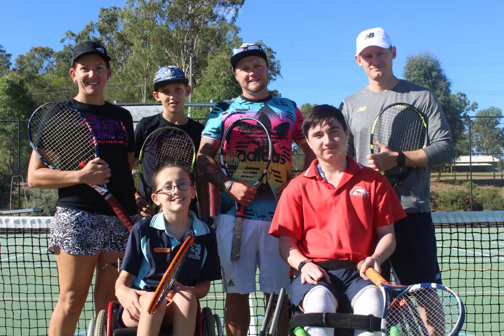 FuturePros Tennis Academy coaches AJ Thompson, Hunter Thompson, 12, Kiel Lindner and National Pathway Manager Wheelchair Tennis for Tennis Australia Alex Jago with keen tennis players Katherine Russell, 11 and Kyle Haslam, 14.