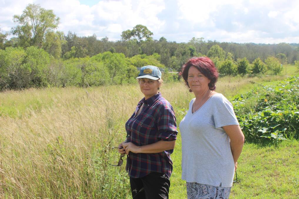 Jimboomba Community Garden's Georgie Francis and Raelee Veering  are excited about developing the creek bed on the grounds of Hills College as part of the traineeship program.
