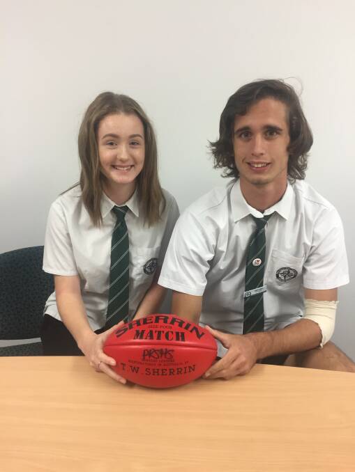 Leaders: Park Ridge High School AFL Academy members and vice captains Caitlin McMaster and Jack James are confident their teams will taste more success this year. Photo: Joshua Paterson.