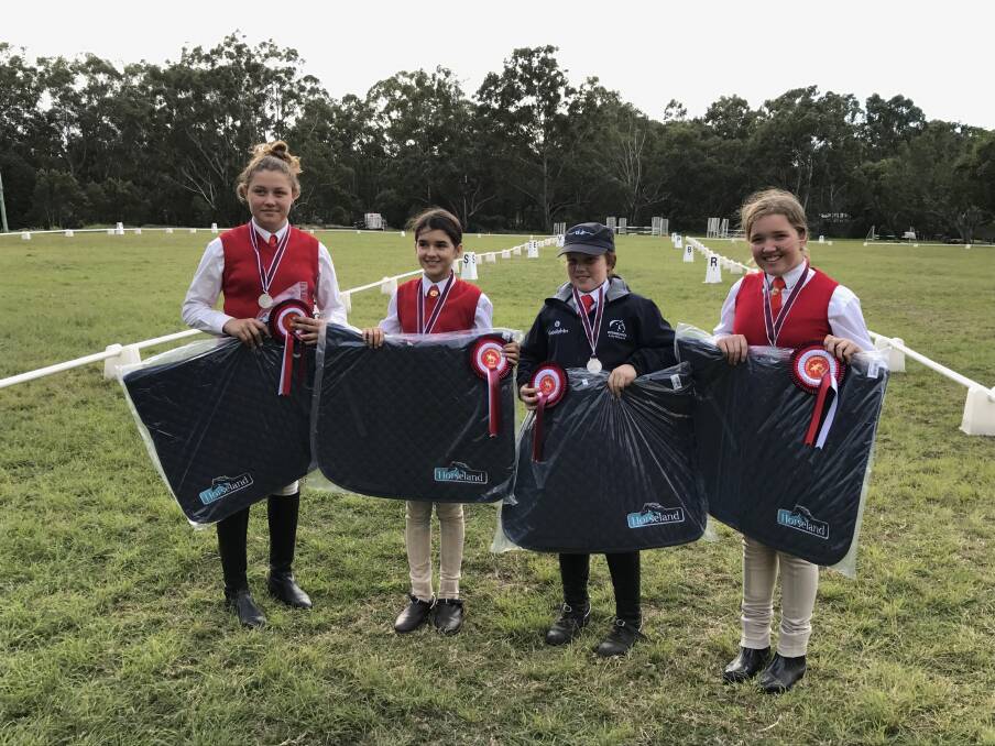 The Jimboomba Pony Club 12 and under team.Kasey Landers, Jess Northey, Danielle McMahon, Sophie Peach.