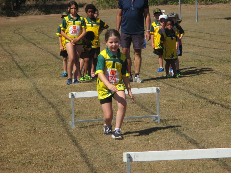 Up and Over: Jenaya Browne practices hurdles at Jimboomba Little Athletics. Photo: Supplied