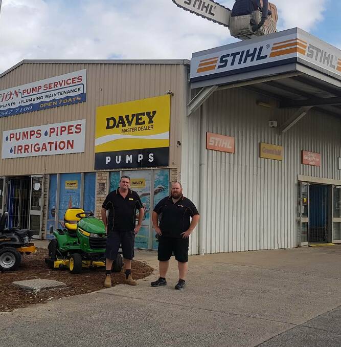 LOCALLY OWNED: Gary Harvey and Terry Harvey stand outside the business started by Gary's grandparents George and Margaret Harvey in 1997.