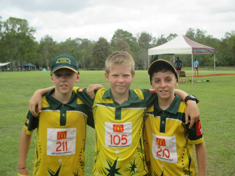 Teammates: Charlie Schultz, Jack Addley and Harry Schultz competing at the Springwood carnival. Photo: Supplied.