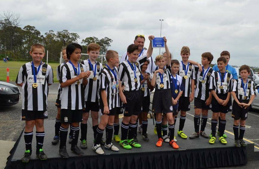 Jimboomba United Football Club's under 13 division 3 team celebrated winning Division 4 in the under 12s last season.