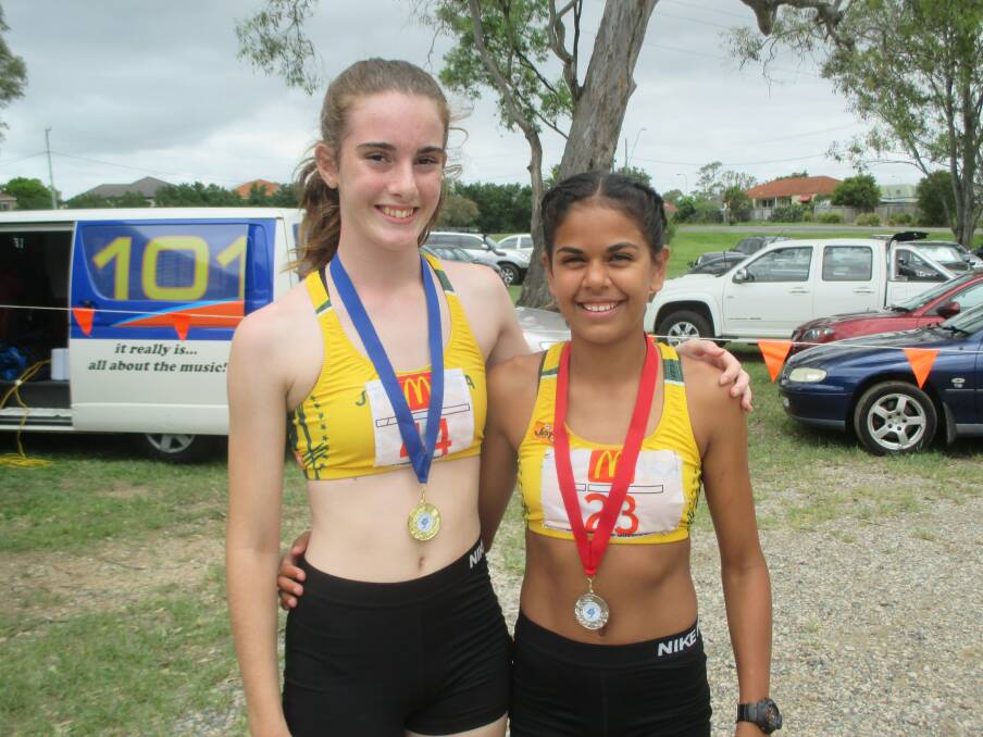 Medalists: Jesica Draper and Tiana Isua gold and silver medalists in the under 13 girls 100m, 200m and 400m events on Sunday. Photo: supplied.

 