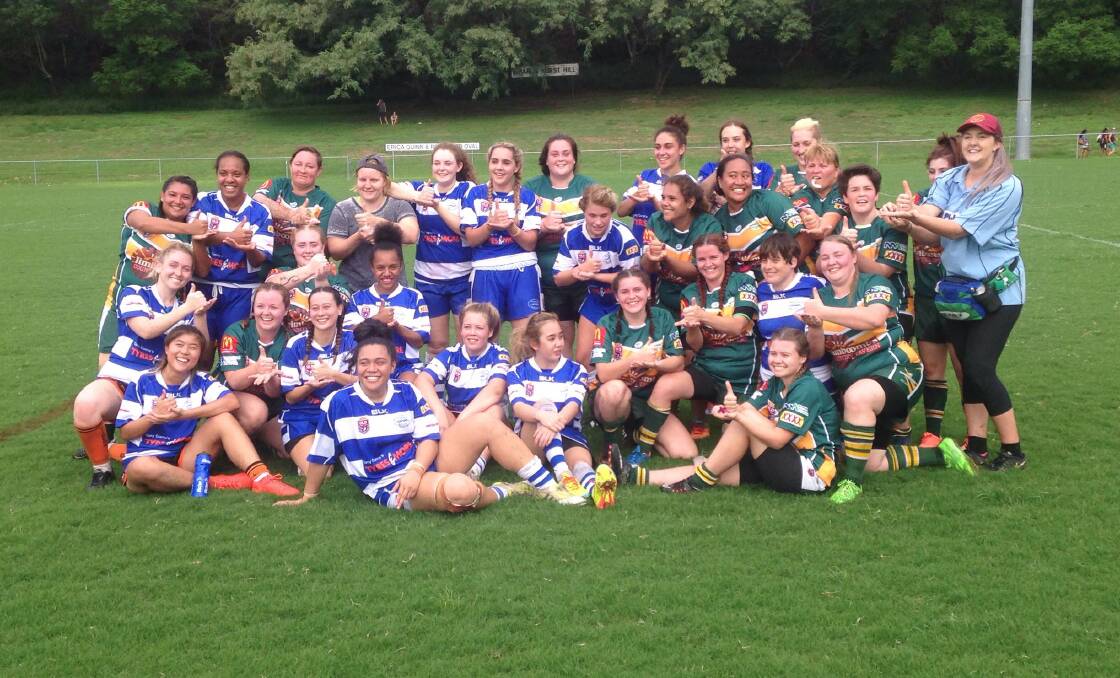 Good game: The Jimboomba Thunder Women get together with Normanby Hounds after their game on the weekend. Photo: Supplied.