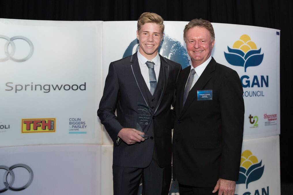 Young Sportsperson (male) of the year Ashley Moloney with Professor Graham Cuskelly from Griffith University. Photo: Supplied.