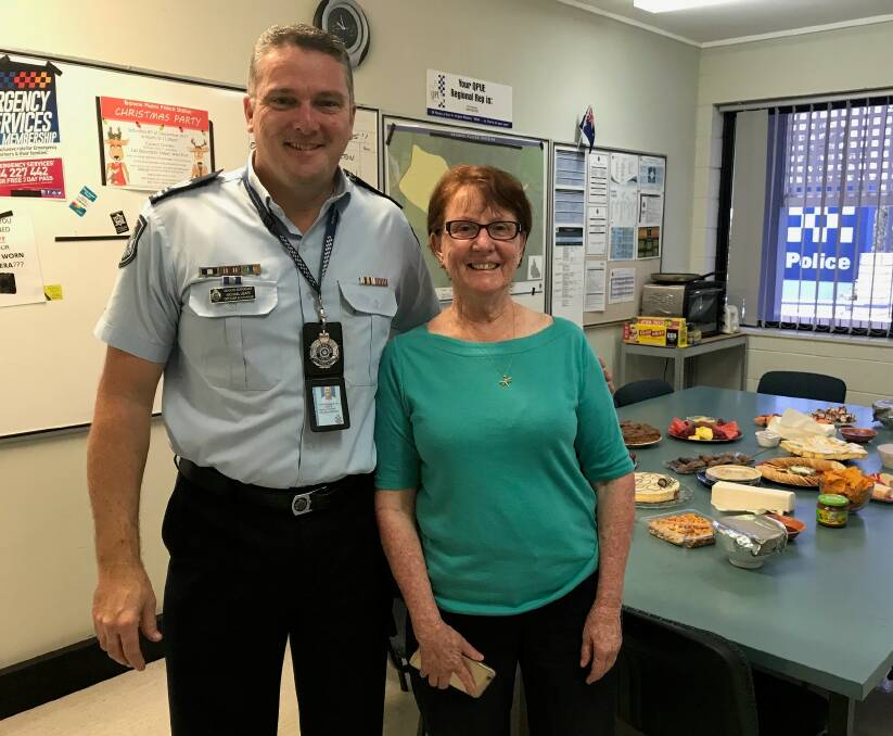 RETIREMENT: Senior Sergeant Michael Leafe with Patricia Quarrie at a morning tea Browns Plains police station-style. Photo: Supplied