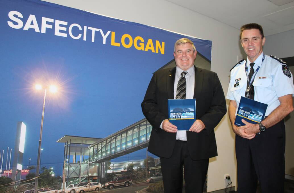 IN PARTNERSHIP: Logan City councillor Laurie Smith with QPS Logan District Inspector Glen Allen at the launch of the strategy last year. Photo: Cheryl Goodenough