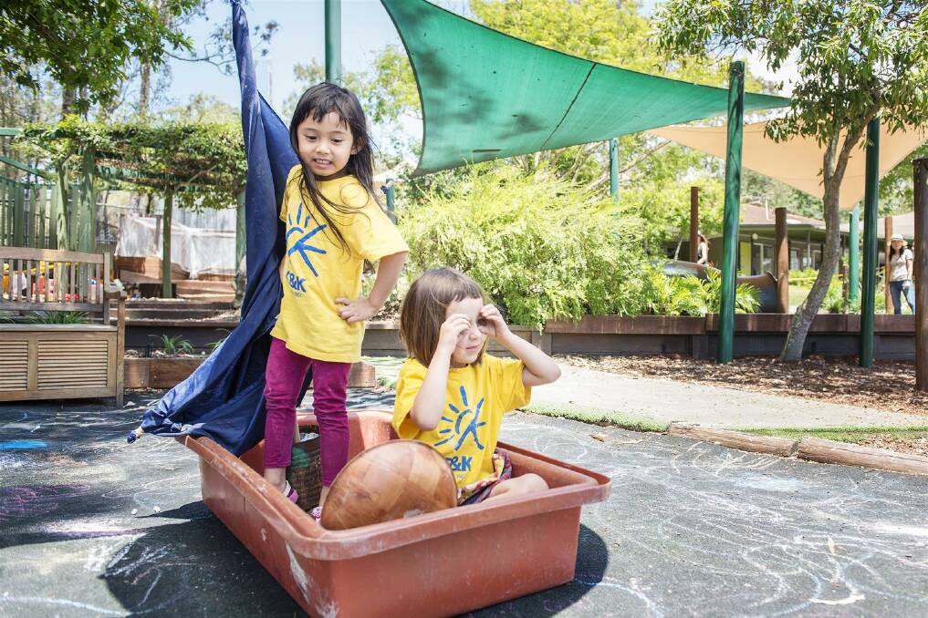 EXPLORING: Kindy students have fun exploring in the playground at C&K. Photo: Supplied