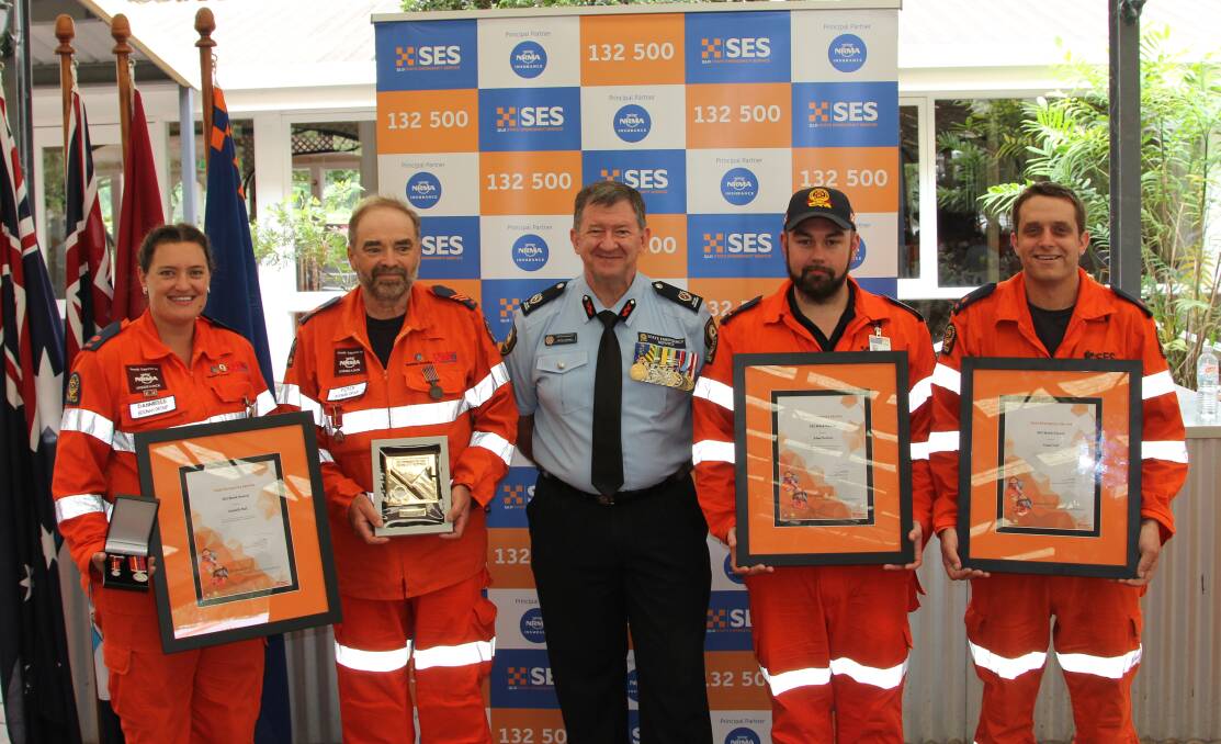 AWARDS: At the SES Gold Coast award ceremony are Danni Bull, Peter Wearmouth, Assistant Commissioner SES Peter Jeffrey, Adam Dorricott and Daniel Hall. Photo: Supplied