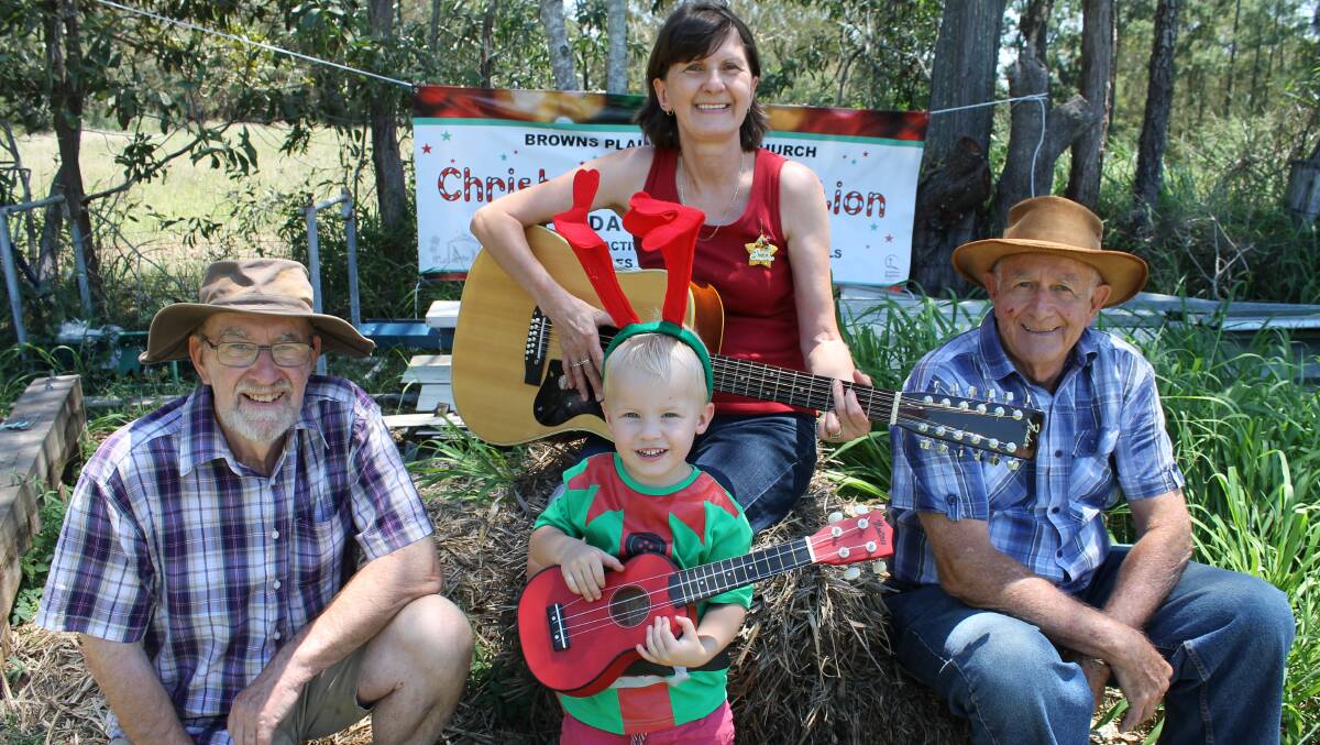AUSSIE CHRISTMAS: Bush carols organisers Chris Wren, Karen Jones and Peter Longsdale, with Dylan Russ, would like to bring the community together for Christmas.