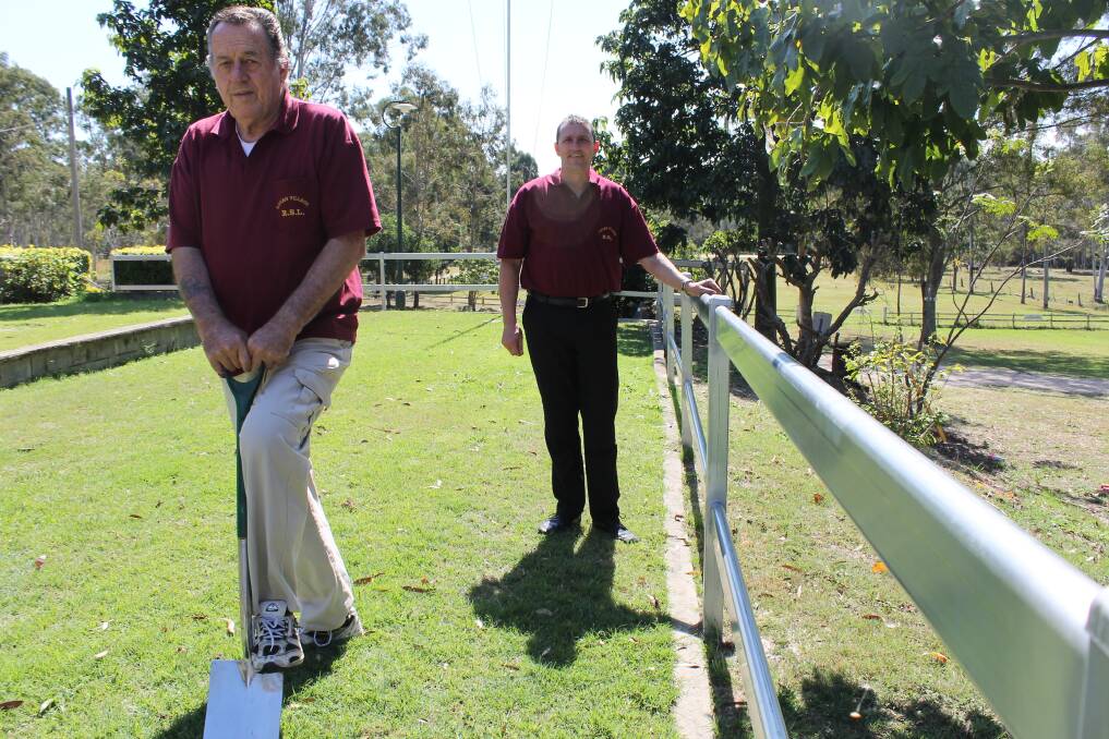 Logan Village RSL assistant treasurer Bruce Colclough and treasurer Sidney Goodwin want to pay tribute to past members by building a memorial wall.
