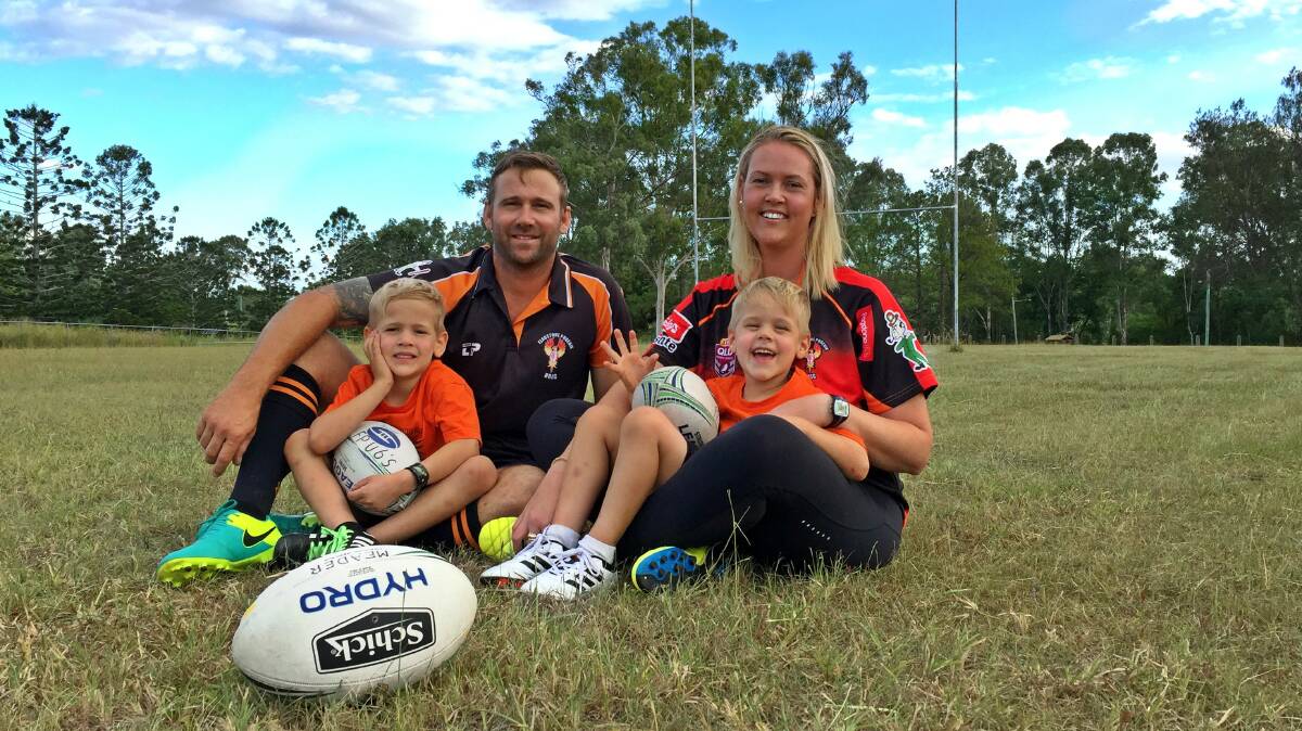 PLAYERS: Ben and Lisa Meader, with their five-year-old son's Cooper and Levi, have been involved with the Flagstone Phoenix Brothers Rugby League Club since April last year. Photo: Louise Starkey
