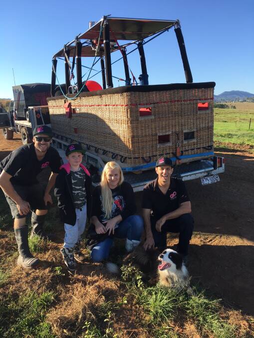 UP AND AWAY: Go Ballooning owner Murray Blyth, Braxton Wauchope, 5, Tash Wauchope and pilot Simon Caswell were ready to take flight and view the Scenic Rim from above.