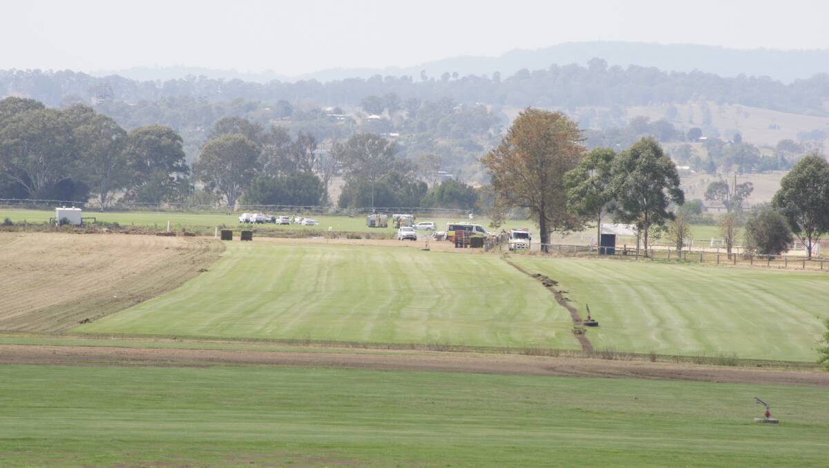CRASH: Emergency services on scene at Brookland Road at Allenview after a plane crashed into the paddock of a turf farm. Photo: Georgina Bayly 