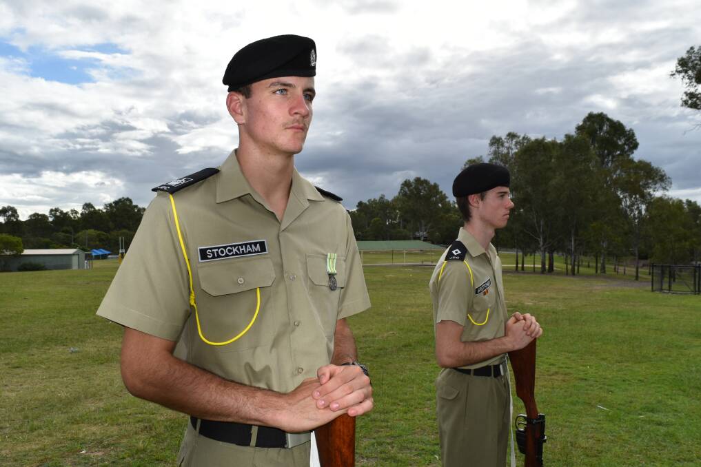 STANDING GUARD: The catafalque party's Mathew Stockham and Dean Brettoner from the Jimboomba and Districts Cadets. Photo: Hannah Baker