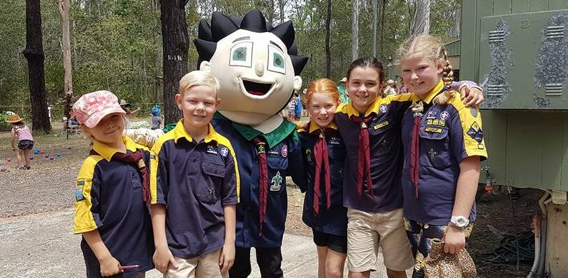 OUTSIDE FUN: Children at the Big Day Scout held last month at the Jimboomba Scouts base. Photo: Supplied
