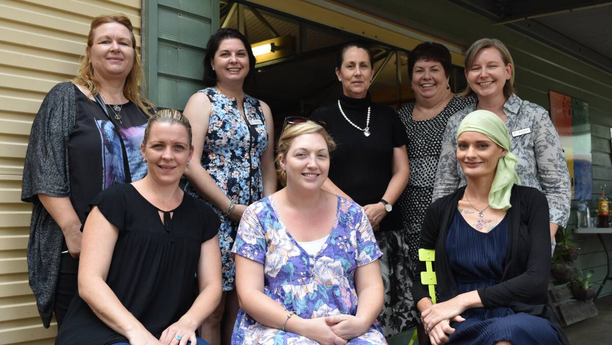 HELPING HANDS: Helen Payne, school guidance officer Evie Mcgregor, principal Penny Eising, deputy Wendy Gray and chaplain Marlo Bronzi. Front from left is Megan Walsh, Sarah Splarn and Sandra Addley, who helped set up the Green Shed.. Photo: Hannah Baker