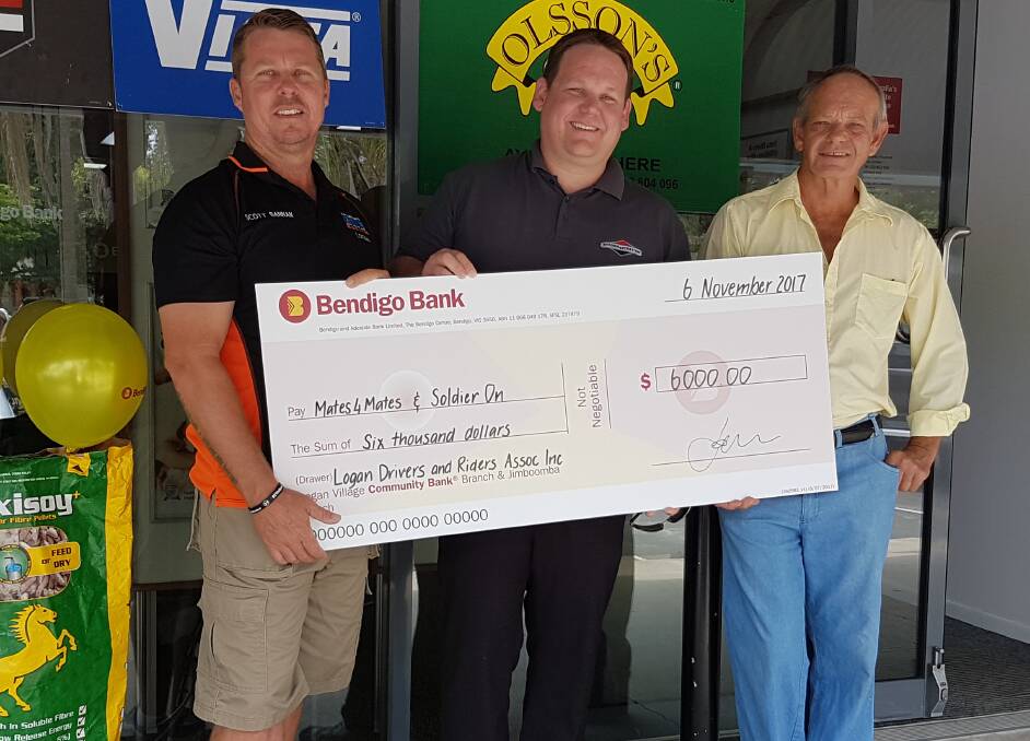 CHEQUE: Super Cross sponsor Scott Bannon, Briggs and Stratton  sponsor Damien Souter and LDRA Catering/Ground Maintance Garry Cook proudly display funds raised at a recent show.