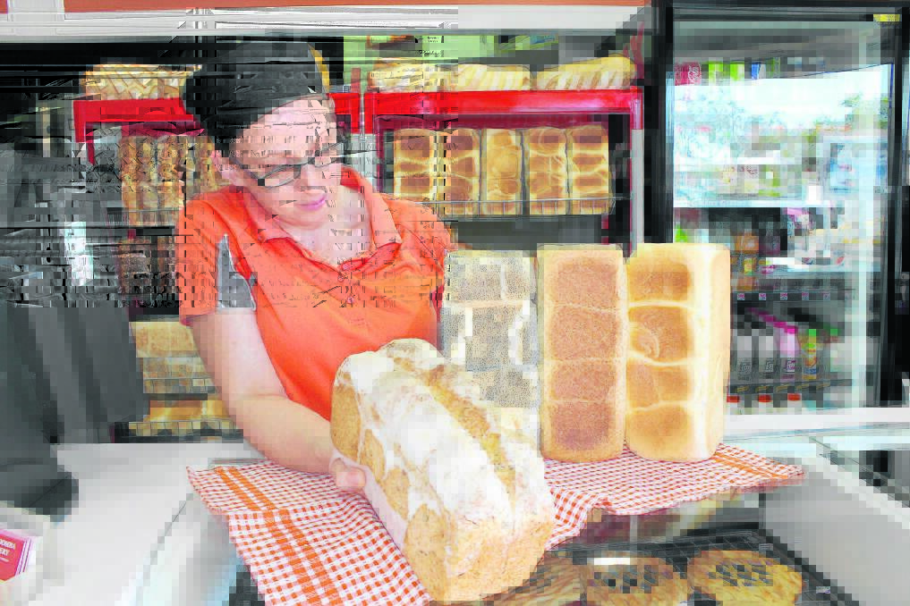 Jimboomba Bakery owner Holly Wilson is unfazed 
by Woolworth's decision to drop its bread prices.