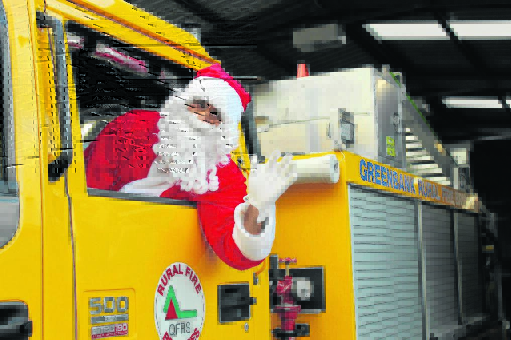 Santa is looking forward to meeting lots of children at the Greenbank Rural Fire Station's  
Christmas open nights next month.