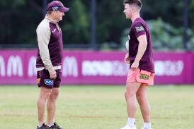 Jock Madden (right) has learned a lot about playmaking from Brisbane coach Kevin Walters (left). (Russell Freeman/AAP PHOTOS)