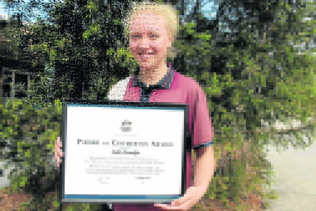 Emmaus College year 12 student Jade Annakin with her  
Pierre de Coubertin award.
