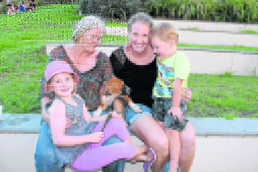 Lillianne, 6, Patricia, Flossy the dog, Jocelynne and Isaac Berry-Sheppard, 4, of Woodhill enjoyed the Youth Week concert at Flagstone.
