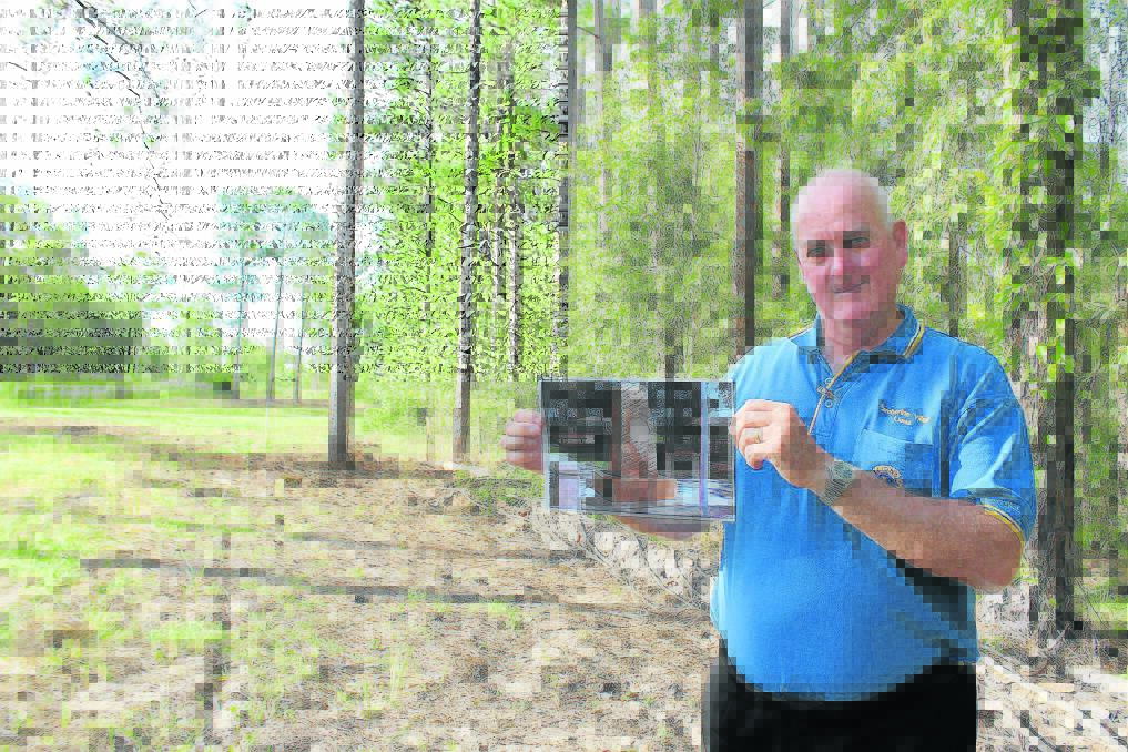 Tamborine Village Lions Club secretary David Walker in front 
of the land where the club would like to build a cenotaph.
