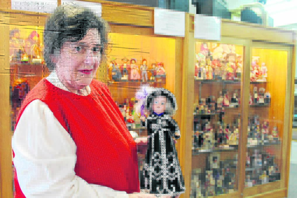 Lyn Ryan's display includes a doll wearing a 'Pearly Kings and Queens' outfit hand-stitched by Beaudesert woman and Brisbane Doll Society founding member,  
Gladys Dennis.