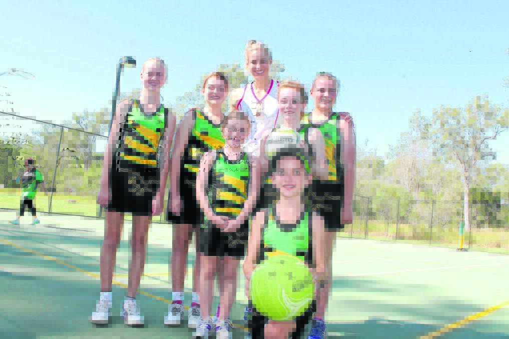 Australian netball captain Laura Geitz with Falcons netball players Hayley Hollindale, Ruby Turner, Daisy Joslyn, George Walker, Libby Joslyn and Louella 
Willaton during last week's coaching clinic.