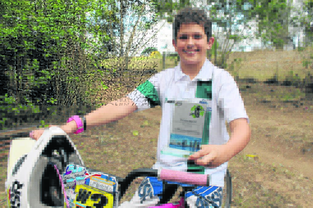 Alex Asmus placed third in the 11 years class at the 2014 BMX World Championships.