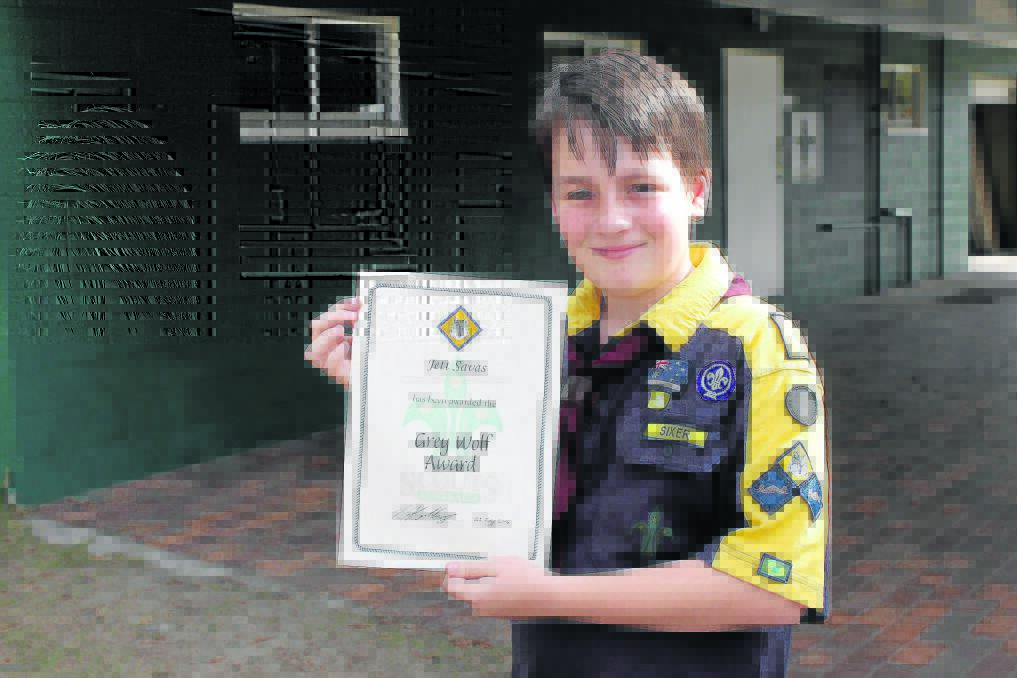 Greenbank Cub Scout Jett Savas, 11, has earned the coveted Grey Wolf badge.