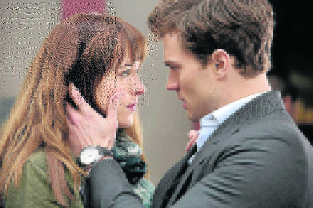 Anna and Christian stare meaningfully into each other s eyes during a scene in Fifty Shades of Grey.