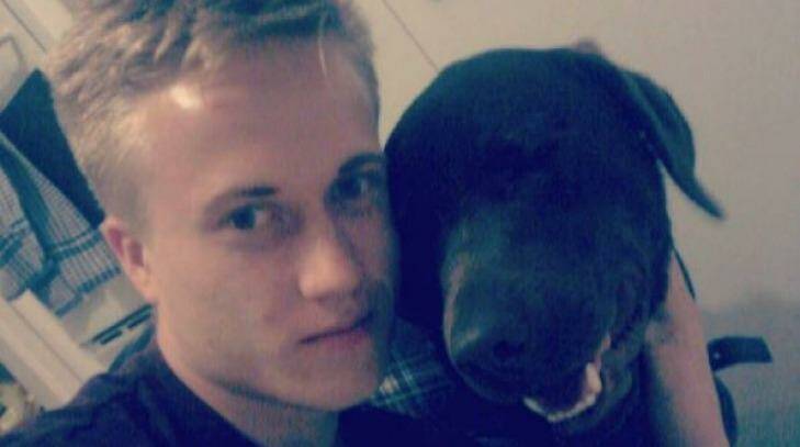 Trent Thorburn poses with a dog for a photo posted to Instagram.