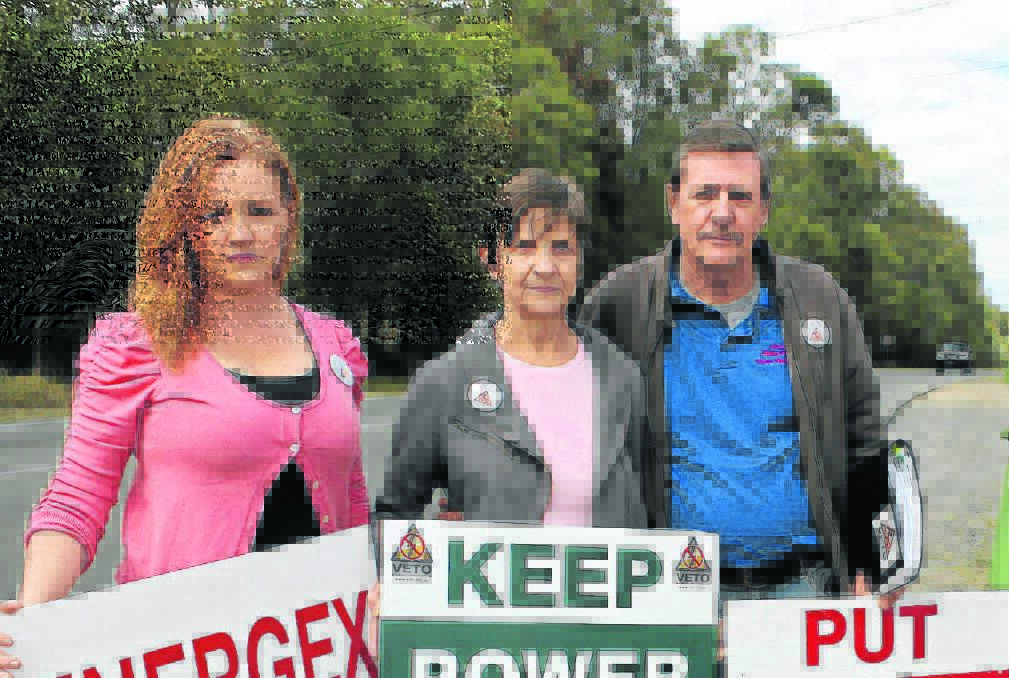 VETO representatives Laurie Koranski, Linda and Paul Casbolt protest against the Loganlea to Jimboomba power line.