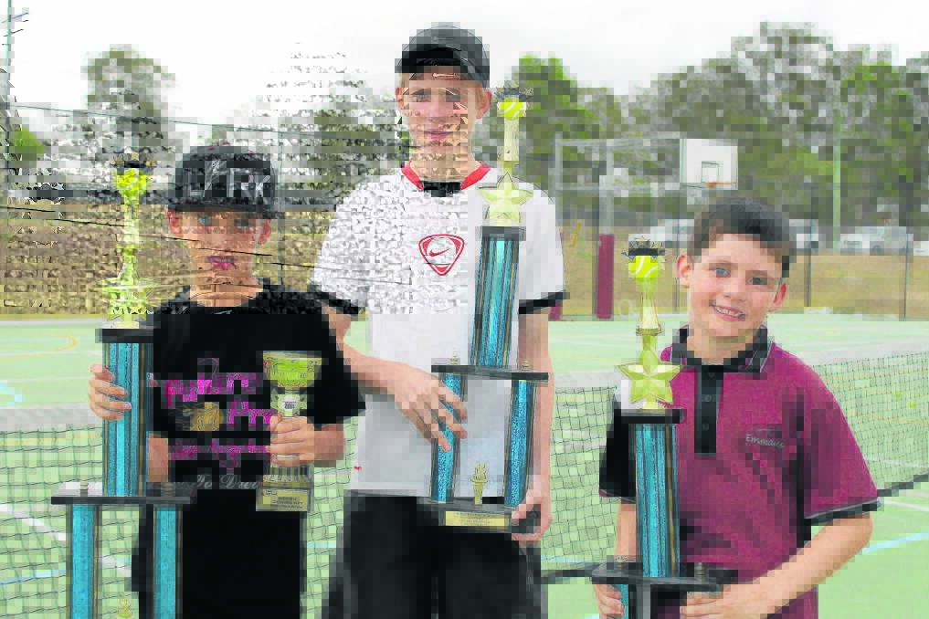 FuturePros Tennis Academy members Hunter Thompson, Josh Irwin and Jacob Marks with the trophies they won for placing first and second in Brisbane and Gold Coast tennis tournaments.