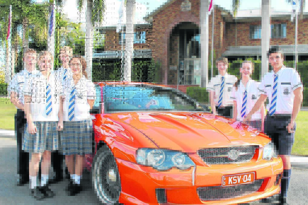 Hills College year 10 students Damon Taylor, Byron Senysyn (back left), Emily Cooper, Kait Layton (front left) and Kane Hall, Vanessa Houghton and Ryan Galea (right) are looking forward 
 to the school's car show fundraiser on August 24.