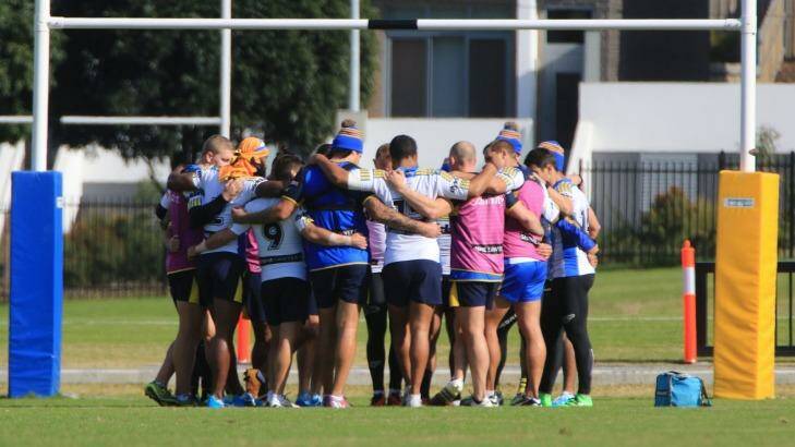 United front: The Parramatta Eels came together at training on Friday to try to focus their attention on the Sharks. Photo: Kirk Gilmour
