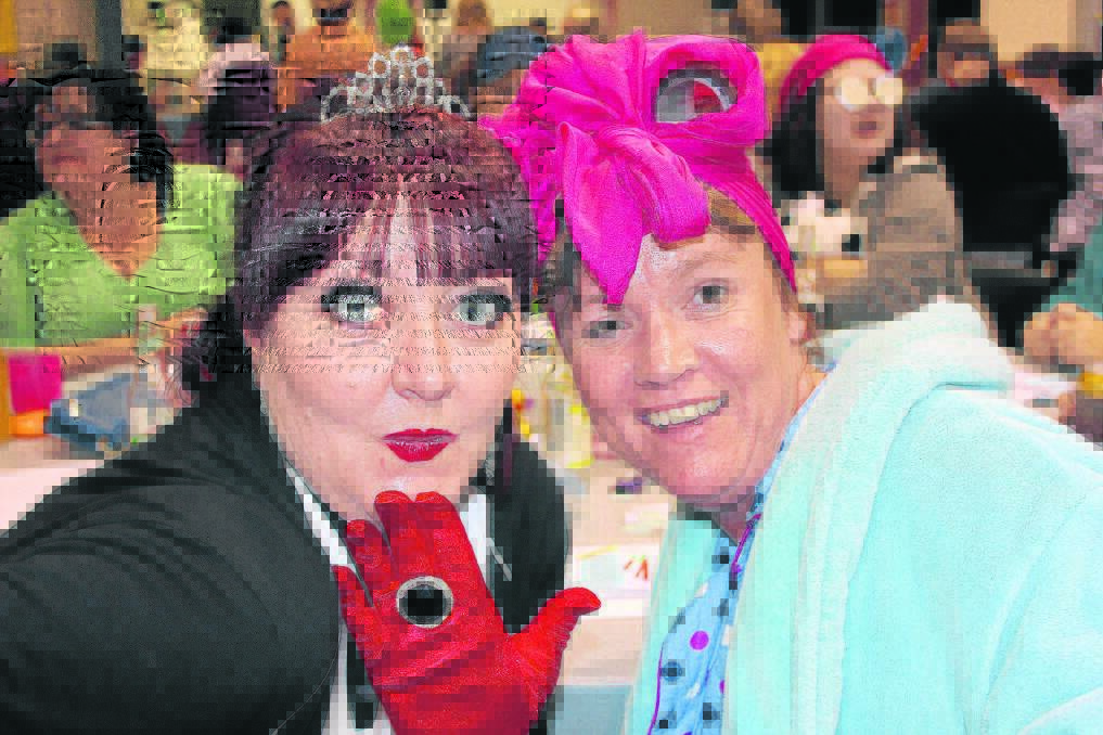 Tracy Wilson and Cally Caird take part in the Emmaus College trivia night for Relay for Life.
