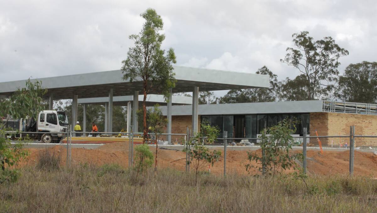Construction is under way for a new Caltex service station and fast food outlets at North Maclean.