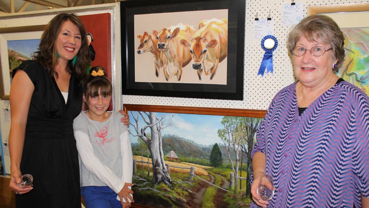 Kalbar artist Kate Woodward won category A, traditional art, with her pastel work, Friendly Locals, while her daughter Lillian Woodward, 9, and mother Merlyn Schrader of Aratula also entered their work.
